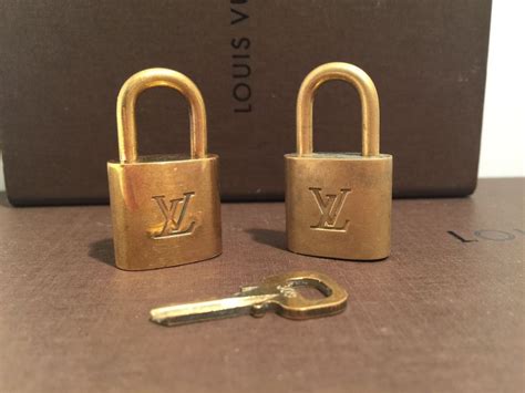 louis vuitton lock gold|More.